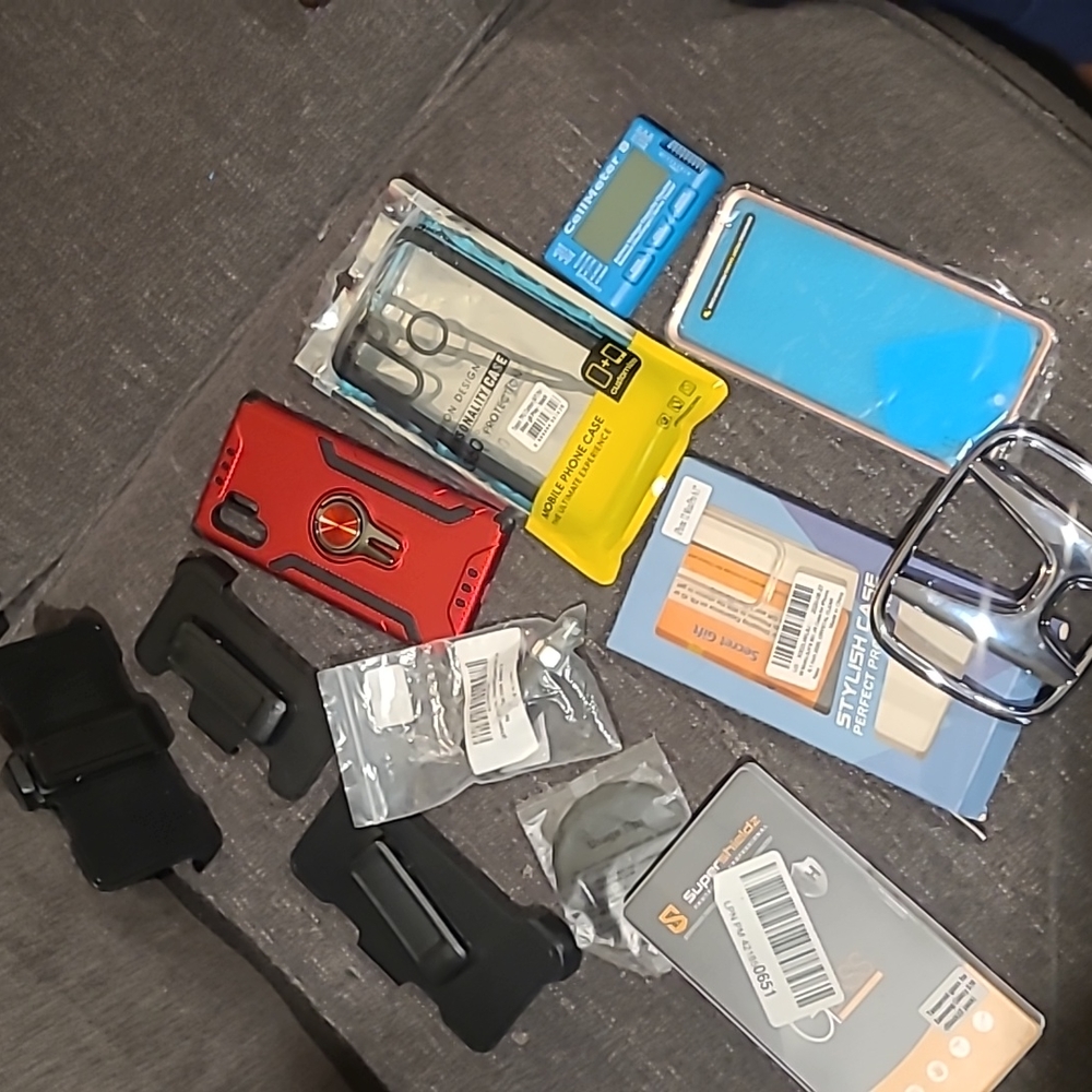 Bag full of phone chords,cases etc